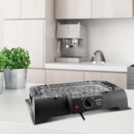 Churrasqueira Gourmet Britânia 1200W: grelha inox, 2 alturas e bandeja 1,2L para assados práticos e saborosos. - Imagem 6
