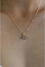 Colar Nossa Senhora Aparecida banhado a 18k com zircônias, ideal para presentear com elegância e fé - Imagem 7