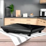 Cooktop Indução 1 Boca Portátil 127V: aquece rápido, economiza energia e oferece segurança com trava e painel touch. - Imagem 3