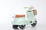Scooter Elétrica Com Banco Acolchoado Menta 6V Bandeirante com farol, som USB e bagageiro para brincar com estilo e praticidade. - Imagem 7