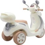 Scooter elétrica infantil Bella T3 6V com LED, música e bagageiro para brincar com estilo e segurança até 30kg. - Imagem 8