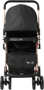 Maxi Baby YouTurn: carrinho com alça reversível, capota extralonga e segurança para passeios confortáveis. - Imagem 3