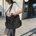 Bolsa mensageiro de lona grande com vários bolsos: prática, versátil e ideal para mulheres e homens no dia a dia. - Imagem 2
