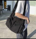 Bolsa mensageiro de lona grande com vários bolsos: prática, versátil e ideal para mulheres e homens no dia a dia. - Imagem 3