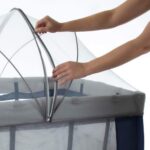 Berço Infanti Stelle 0 a 18kg: portátil, completo e seguro, com 2 alturas, trocador, mosquiteiro e abertura lateral. - Imagem 9