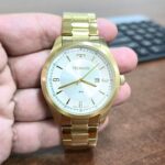 Relógio Technos Masculino Steel Dourado: design analógico elegante, resistente e ideal para compor um visual sofisticado. - Imagem 4