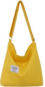 Bolsa Covelin retrô grande de lona: estilo casual, prática e espaçosa para o dia a dia.