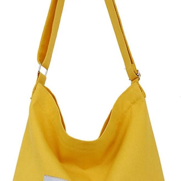 Bolsa Covelin retrô grande de lona: estilo casual, prática e espaçosa para o dia a dia.