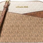 Bolsa Michael Kors Jet Set média em couro: elegante, prática e ideal para viagens e uso diário.