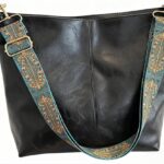 Bolsa de couro PU feminina grande, elegante e espaçosa, ideal para compras e viagens.