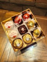 Caixa Bombom Sortido com chocolates suíços e Ferrero Rocher: presente premium para surpreender em ocasiões especiais. - Imagem 2