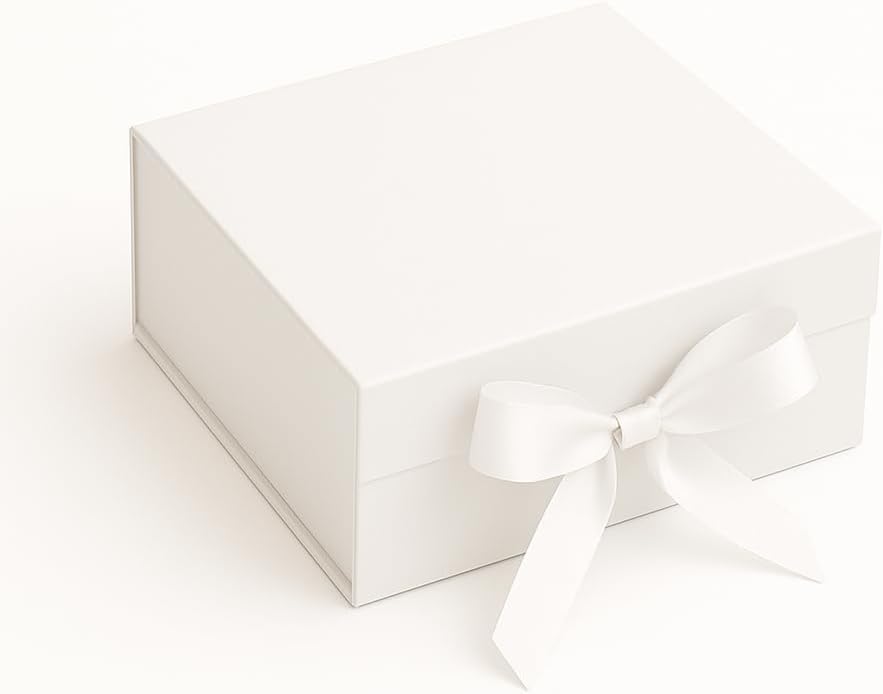 Caixa de Presente Premium Branca: rígida, com trava magnética e Caixa de Presente Premium Branca: rígida, com trava magnética e laço de cetim para presentear com elegância e segurança.