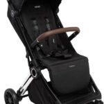 Carrinho Nivola Infanti: compacto, leve e prático, com fechamento automático, mosquiteiro, UV50+ e suporte até 22 kg.