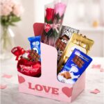 Cesta Presente Premium Namorados Rosa Encantada com chocolates suíços premium, pronta para emocionar e presentear com elegância.