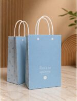 Kit 25 Sacola de Papel Presente Azul com Alça, poá e acabamento glossy, ideal para presentes elegantes e delicados. - Imagem 2
