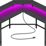 Mesa de jogos Huuger em L com LEDs, tomadas e suporte para monitor: praticidade, organização e imersão total.