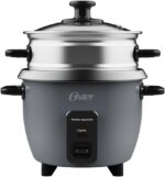 Panela Elétrica de Arroz 0,6L Oster Grafite 220v: prática, compacta e com manter aquecido para o arroz sempre no ponto.