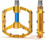 Pedais MTB 9/16" antiderrapantes com 3 rolamentos selados: leve, resistente e ideal para BMX e mountain bike.