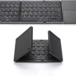 Teclado sem fio BT dobrável portátil com touchpad, leve e prático para Windows, Android e iOS em cinza