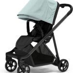 Thule Shine City: carrinho compacto, leve e dobrável com uma mão, ideal para mobilidade urbana com conforto e praticidade.